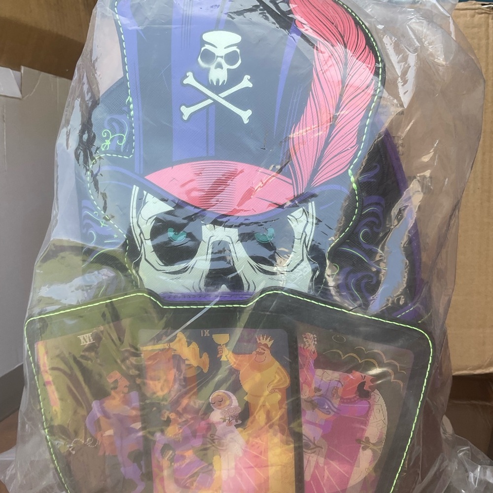LOUNGEFLY LENTICULAR BACKPACK   DR FACILIER   .RETIRED